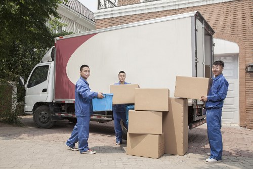Staff handling storage items safely inside Harringay Storage
