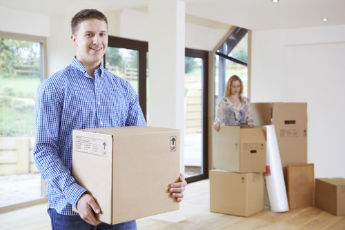 Moving van and packed boxes in Harringay street