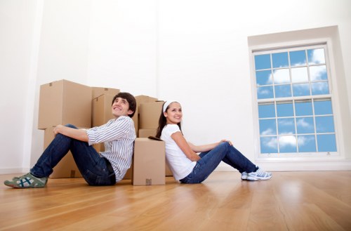 Flat removals team preparing to move boxes in Harringay